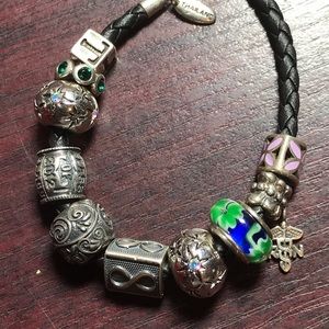 Leather and sterling charm bracelet.